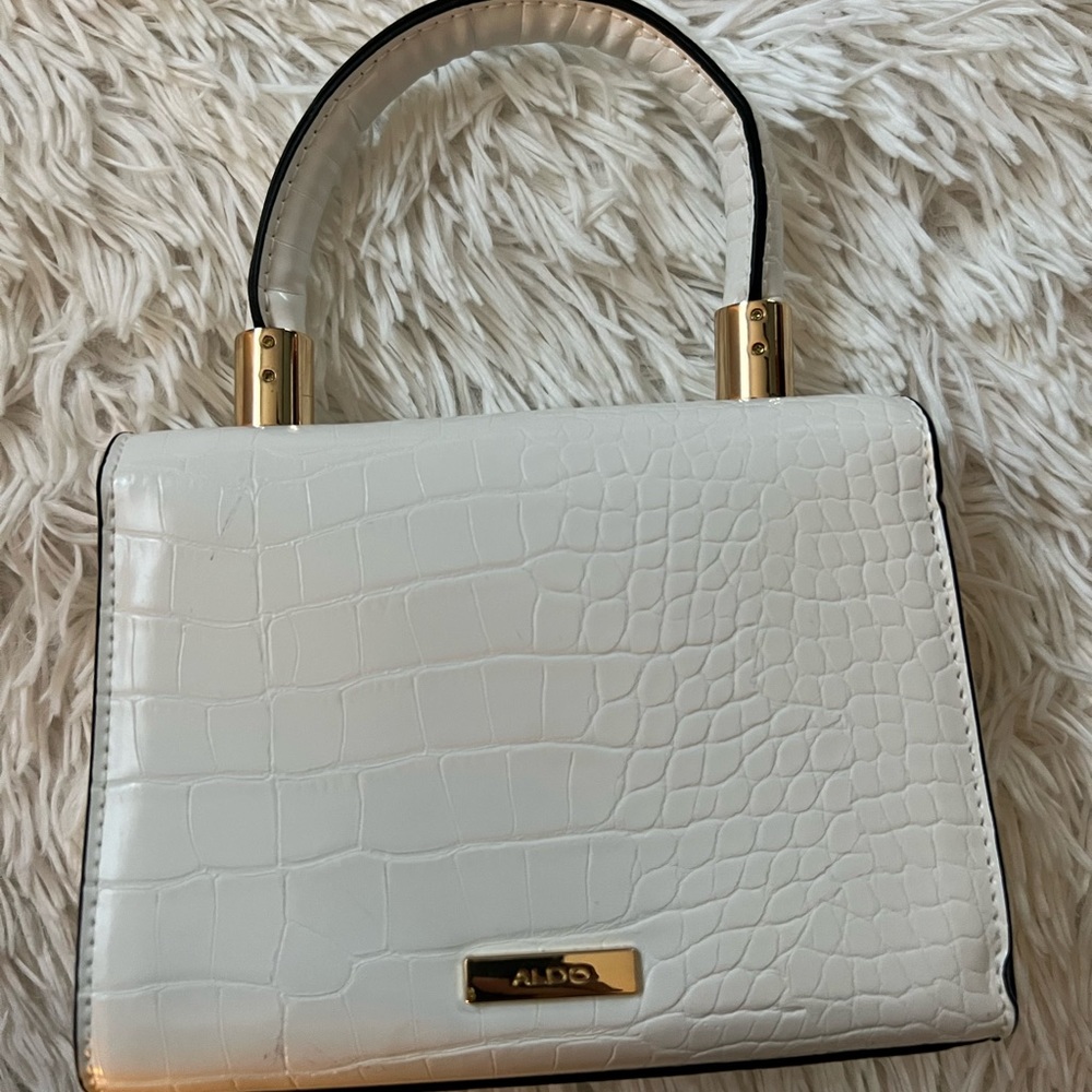 Aldo white bag with gold over the shoulder chain